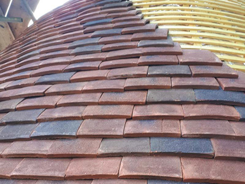 tudor tiles on oast house