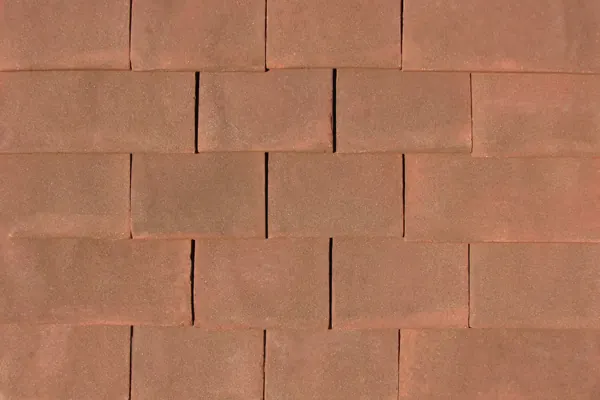 Sussex Brown handmade clay tiles laid on a sample panel