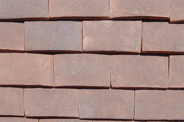 Weathered Earth handmade clay tiles laid on a sample panel