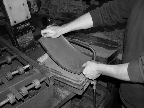 Clay going into a tile mould