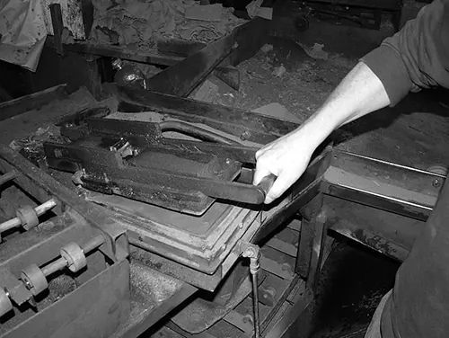 A tile mould being knocked