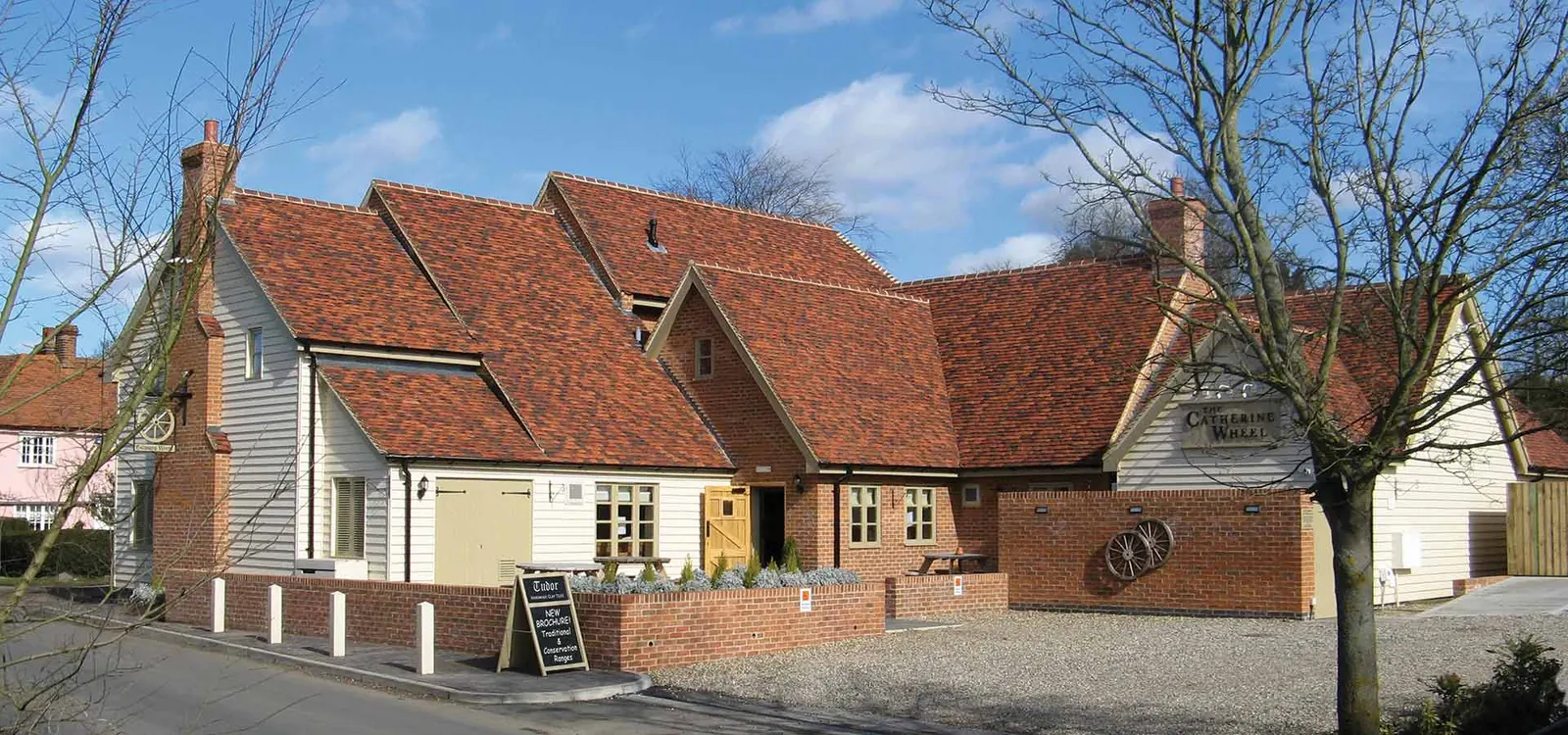 House roofed with Tudor tiles