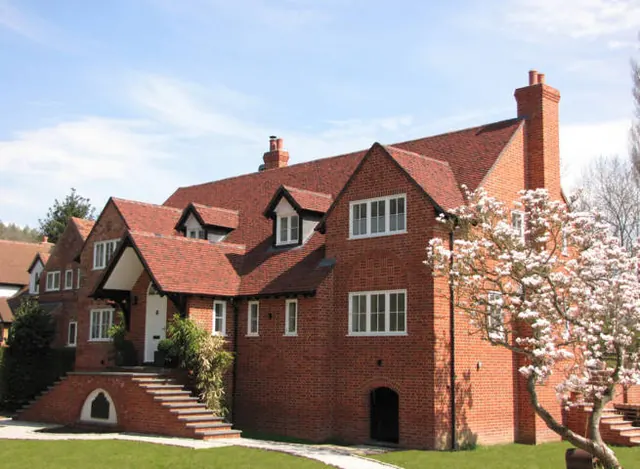 Roof finished in Tudor handmade clay tiles, example 1