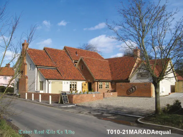 Roof finished in Tudor handmade clay tiles, example 10