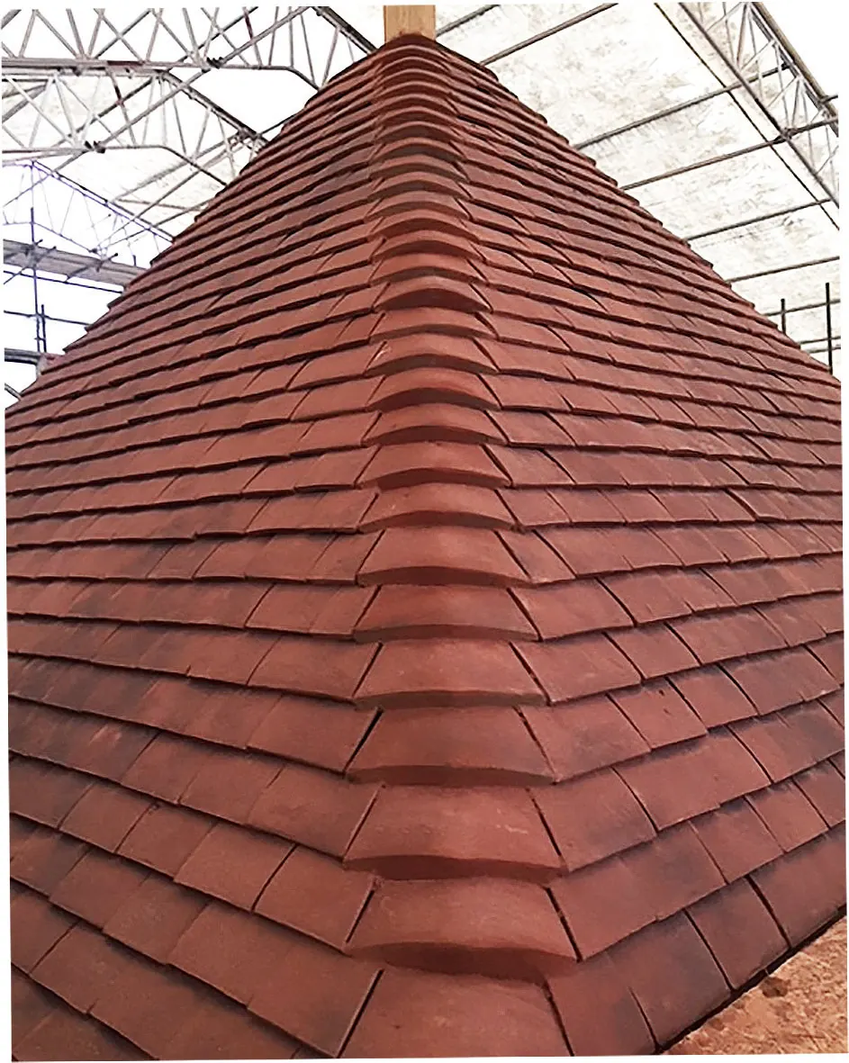 Turret roofed in handmade clay tiles