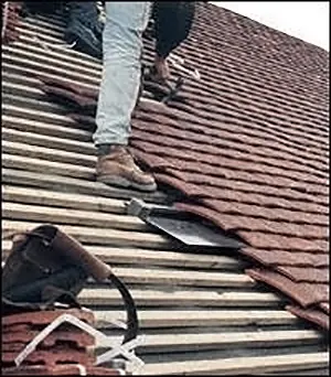 Tudor Under-Tile vent being fitted under handmade tiles